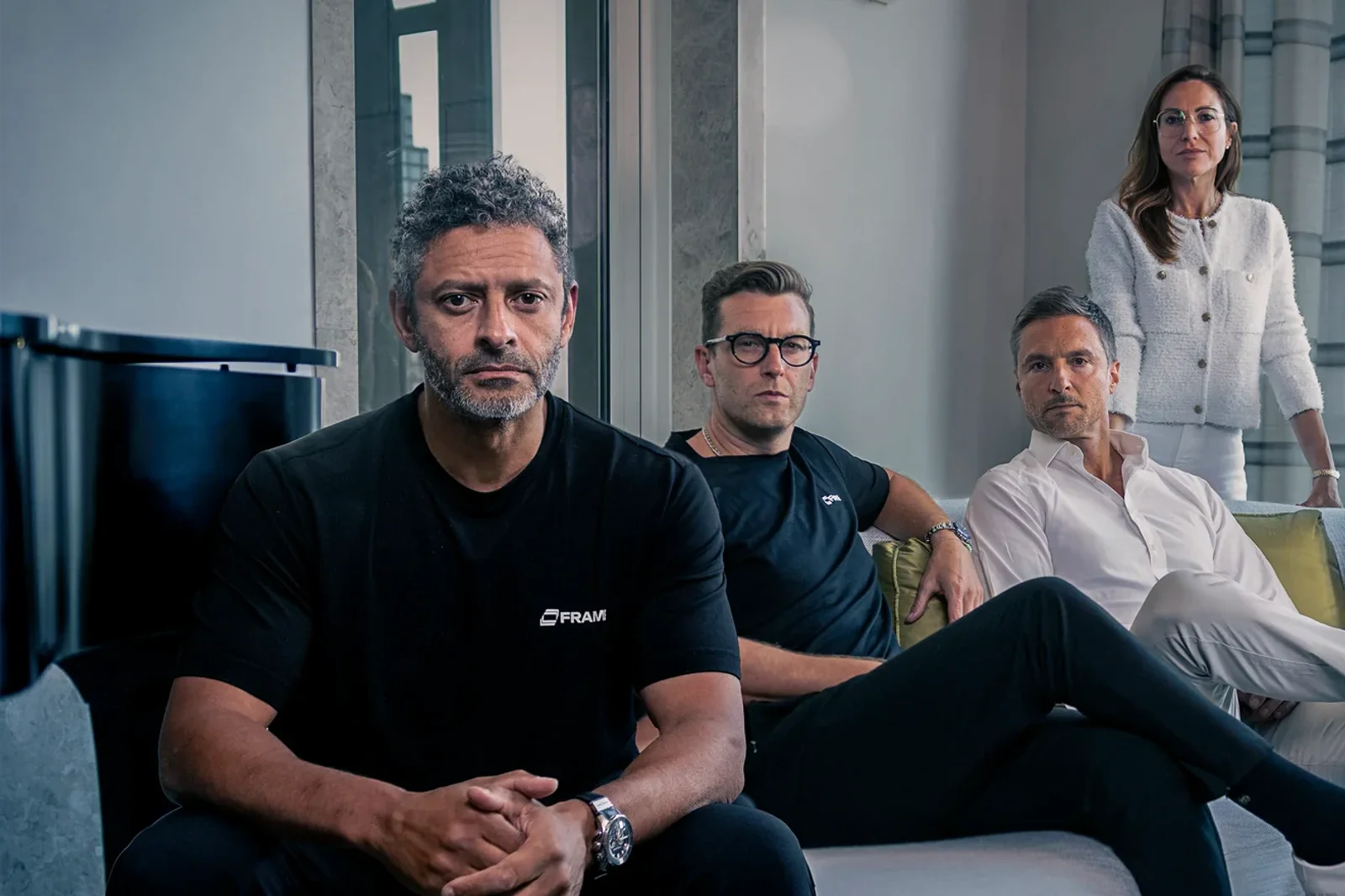 Members of the Frame leadership team together in a meeting space